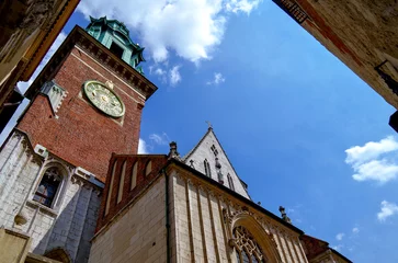 Fototapeten Krakow, Poland popular tourist travel destination with impressive skyline of old town historic architecture and Wawel Castle, Marienchurch outdoor landmarks urban street avenue for shopping © Tamme