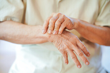 Wrist pain in the elderly or diseases related to rheumatism. Concept of health problems in the...