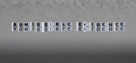 admissible evidence word or concept represented by black and white letter cubes on a grey horizon...