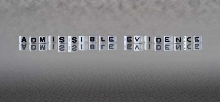 admissible evidence word or concept represented by black and white letter cubes on a grey horizon background stretching to infinity