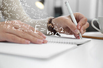 Science and education concept. Illustration of basic physics and mathematics formulas and woman working at table, closeup - obrazy, fototapety, plakaty