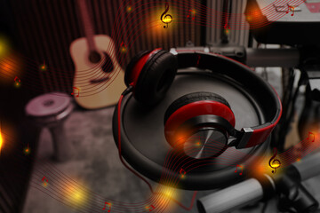 Modern headphones with illustration musical notes at recording studio