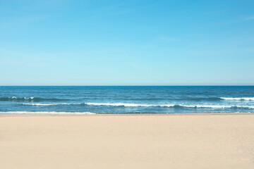 Picturesque view of beautiful sea and sandy beach on sunny day
