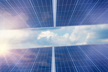 Photovoltaic roof with reflection of the Sun and clouds