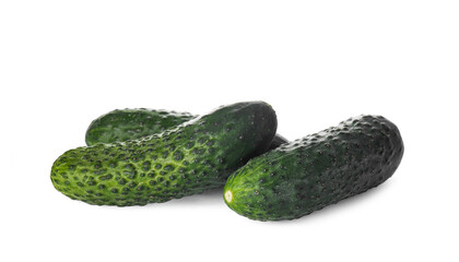 Whole fresh green cucumbers on white background