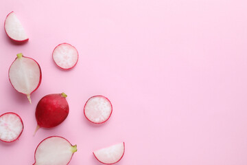 Fresh ripe radish on pink background, flat lay. Space for text