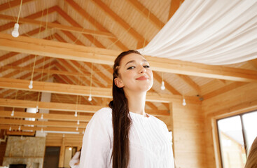 Close up portrait of beauty girl in wooden interior.