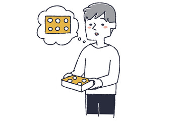 お菓子の容量が減ったなと思っている男性　物価上昇、インフレによって生活に影響を受ける人々