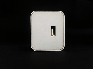 Mobile charger adopter usb port in black background 