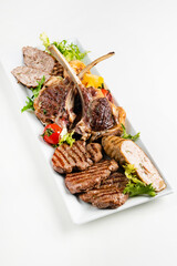 meat appetizer on the white plate