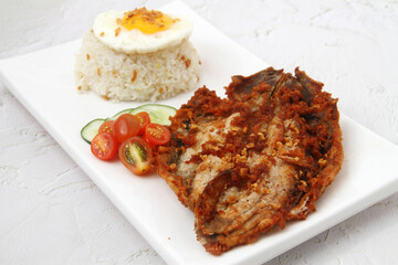 Freshly cooked Filipino food called Bangsilog or fried bangus or milkfish, egg and fried rice