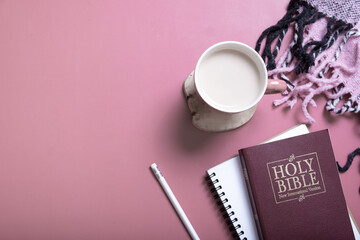 Holy Bible, note with plaid and Cup of Coffee top view. Holy Bible study concept