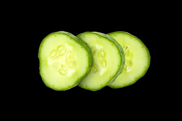 Cucumber slices isolated on black background with clipping path