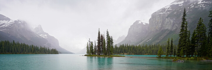 Spirit Island, Maligne Lake, Alberta, Canada, on a cloudy summer day - 518250372