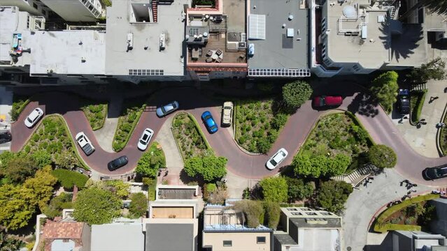 overhead view of famous crooked and narrow section of Lombard Street in San Francisco, CA, amongst buildings