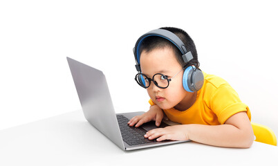 Little boy in a yellow t-shirt working on the Internet. isolated on white background