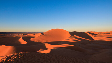 Amazing View to the Golden Sahara Desert Sands near the oasis town Taghit, Algeria