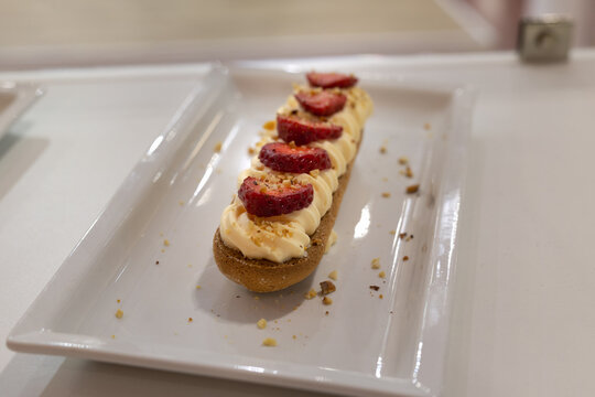 Savoy Cookie filled with Cream, Seasonal Strawberries and Hazelnut Crumbs