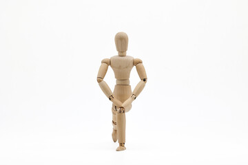 a wooden mannequin doing exercises on white background. warm up exercise