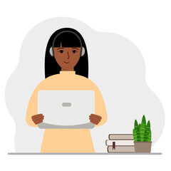 Woman with laptop and headphones. Working from home, student, freelancer, assistant, blogger or businessman. Home office concept.