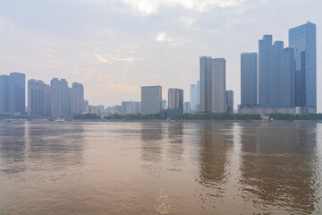 Fototapeta na wymiar The skyline of urban buildings and the scenery of the Yangtze River in Changsha, Hunan Province, China