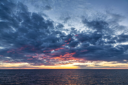 landscape photo of the sea against the background of the sunset sky