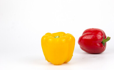 Yellow and red sweet bell pepper path isolated on white background and space for text description