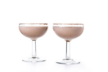Classic Bbandy Alexander cocktail isolated on white background