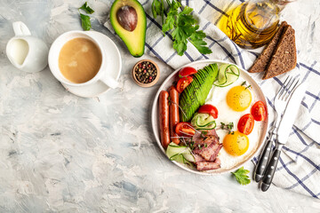 Healthy nutritious paleo keto breakfast diet Fried eggs, bacon, avocado, cheese and fresh salad....