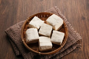 Tahu Putih or Tofu, one of raw ingredient food made from fermented soybean extract. 
