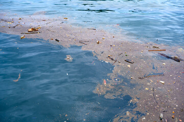 Oil spill on sea surface. Pollution in the water.