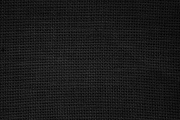 Fototapeta na wymiar Black Hemp rope texture background. Haircloth wale black dark cloth rustic sackcloth canvas fabric texture. 