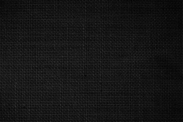 Black Hemp rope texture background. Haircloth wale black dark cloth rustic sackcloth canvas fabric texture.
