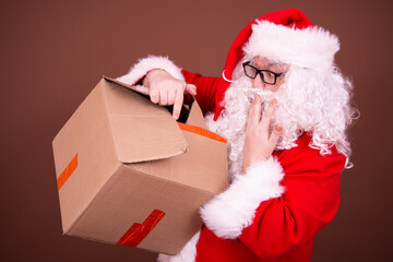 Delivery. Funny Santa Claus with empty boxes.