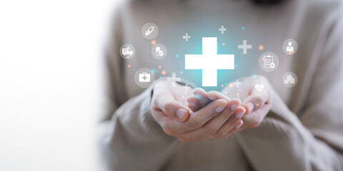 Woman hand holding plus icon for the healthcare medical icon. Health insurance health concept....