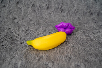 sexy bright lips kissing banana, concept of oral sex, erotica