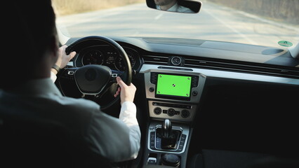 Footage for animation. Cyber space technology. Adult man driving nano auto car with greenscreen mock-up display dashboard service menu application. Automobile wifi internet connect. Transport app