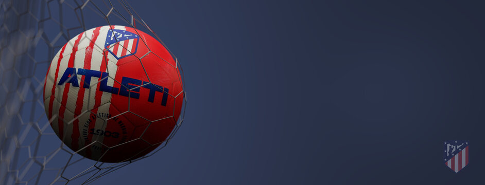 Guilherand-Granges, France - July 20, 2022. LaLiga santander of Spain. Soccer ball in net with official logo of Atl&eacute;tico de Madrid. 3D rendering.