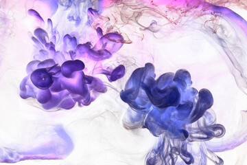 Liquid fluid art abstract background. Mix of purple lilac dancing acrylic paints underwater, space smoke ocean