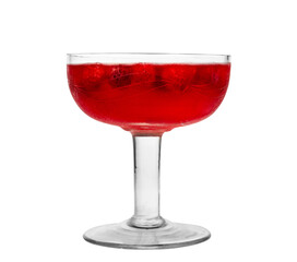 Glass with red drink on a white background. Raspberry dessert in a glass.
