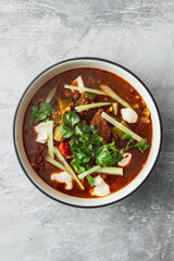 healthy plant-based food, vegan Mexican vegetable stew with beans mock meat celeri and coriander in spicy sauce,