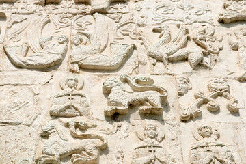 White stone carving on the walls of St. George's Cathedral. Yuryevsky Kremlin (Archangel-Mikhailovsky Yuryevsky monastery). Yuryev-Polsky town, Vladimir region, Russia