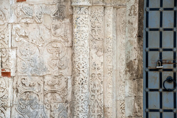 White stone carving on the walls of St. George's Cathedral. Yuryevsky Kremlin (Archangel-Mikhailovsky Yuryevsky monastery). Yuryev-Polsky town, Vladimir region, Russia