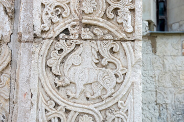 White stone carving on the walls of St. George's Cathedral. Yuryevsky Kremlin (Archangel-Mikhailovsky Yuryevsky monastery). Yuryev-Polsky town, Vladimir region, Russia