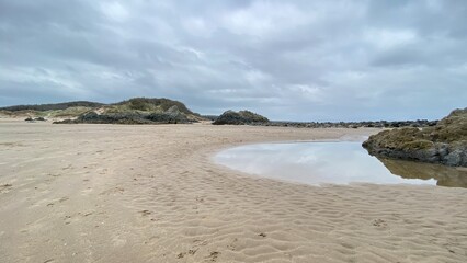 looking out to sea from the rocks and beach
