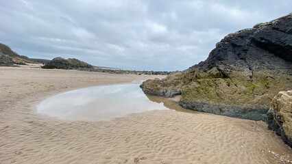 looking out to sea from the rocks and beach