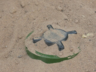 russian anti-personnel mine buried in the sand