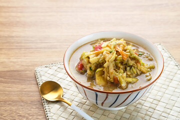 Rujak Serut, Indonesian fruit salad made from grated variety of fresh fruits and mixed with a sauce made of brown sugar, chili, salt and peanuts.
