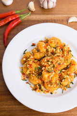 Fried prawns with flour, stir-fried with chili, pepper, salt. One of the popular Chinese food in Indonesia