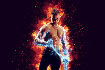Fototapeta na wymiar Muscular man with naked torso holding electric energy chain. Isolated on dark background with fire